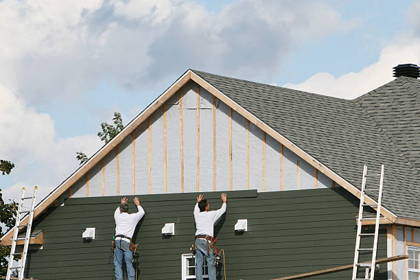 Professional Siding technician working in Newport News, VA